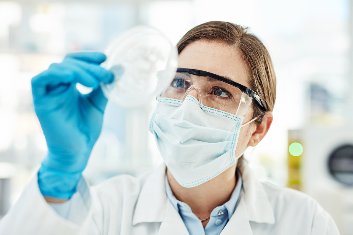 Shot of a young scientist working with medical samples in a lab